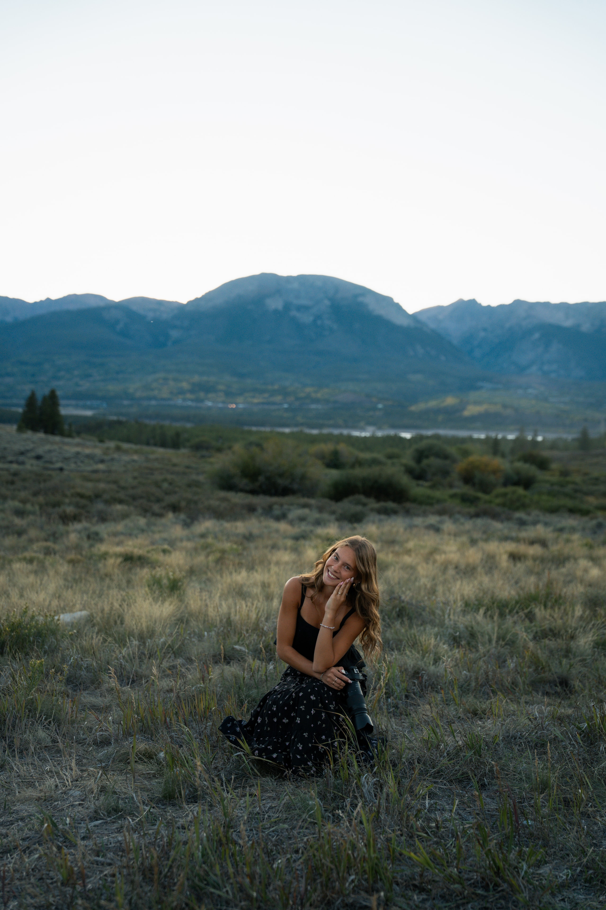 Cara Anne in the forest with her camera
